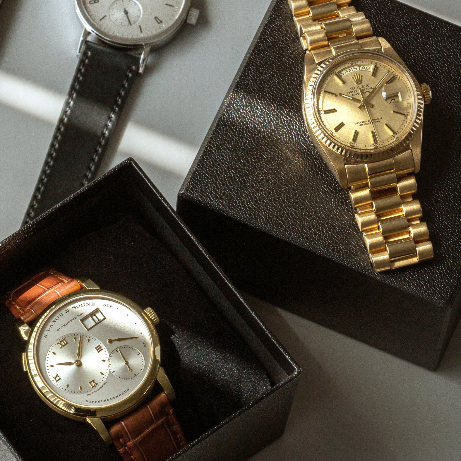 Luxusuhren von Rolex, Lange & Söhne und Nomos