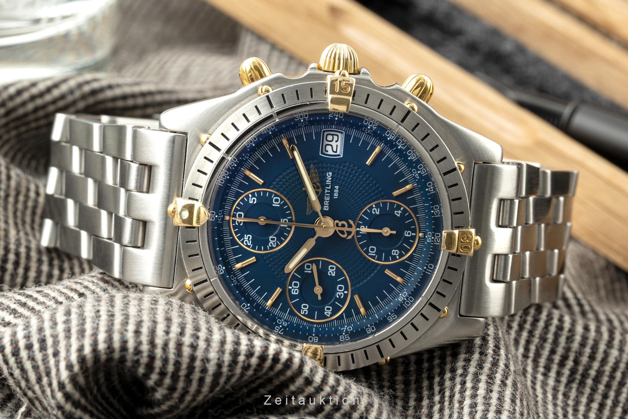 Breitling Chronomat chronograph steel gold automatic B13