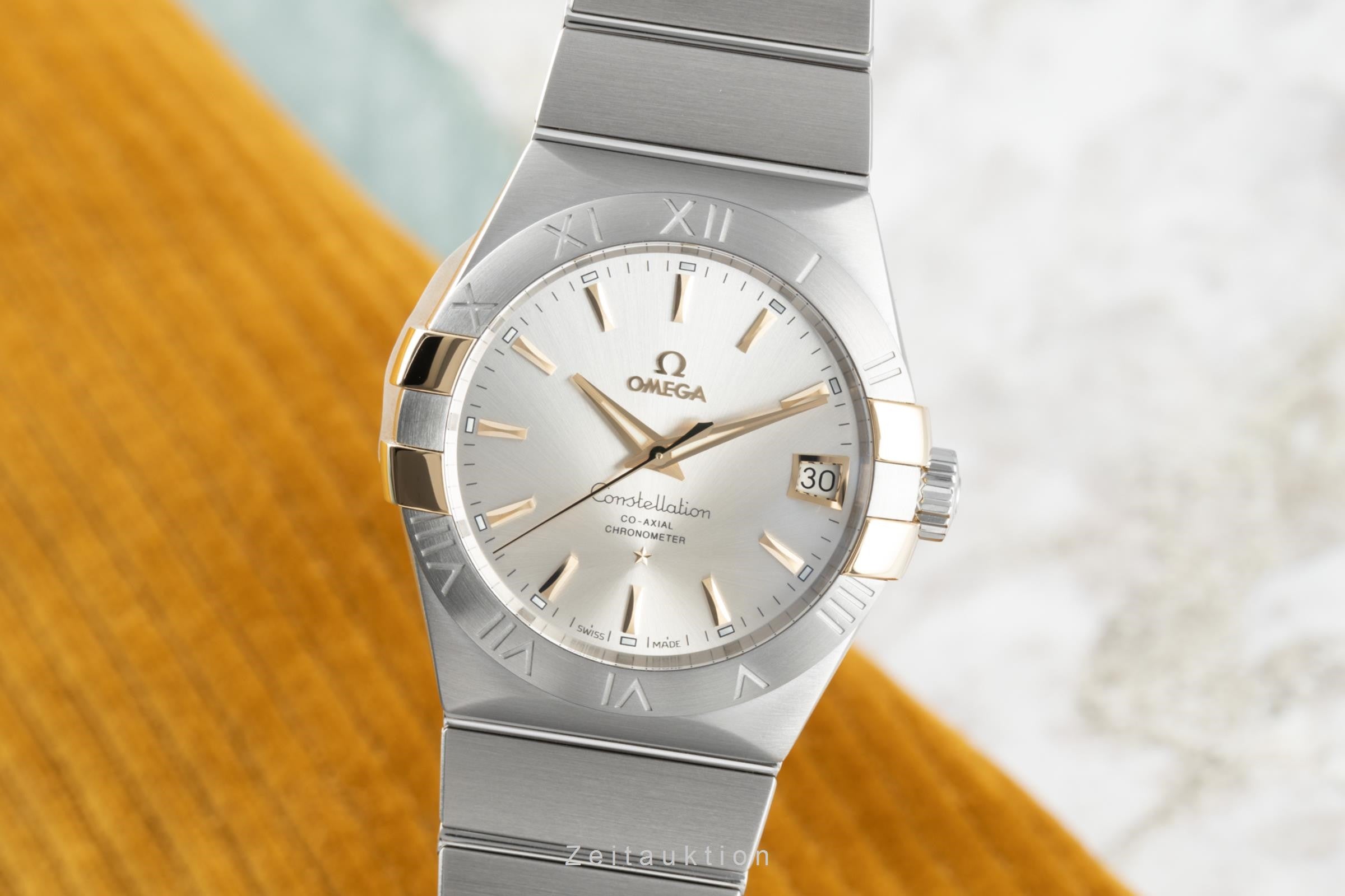Omega Constellation steel / gold automatic men's watch 123.20.38.21.02.005 LP: 6600EUR  [2203049]