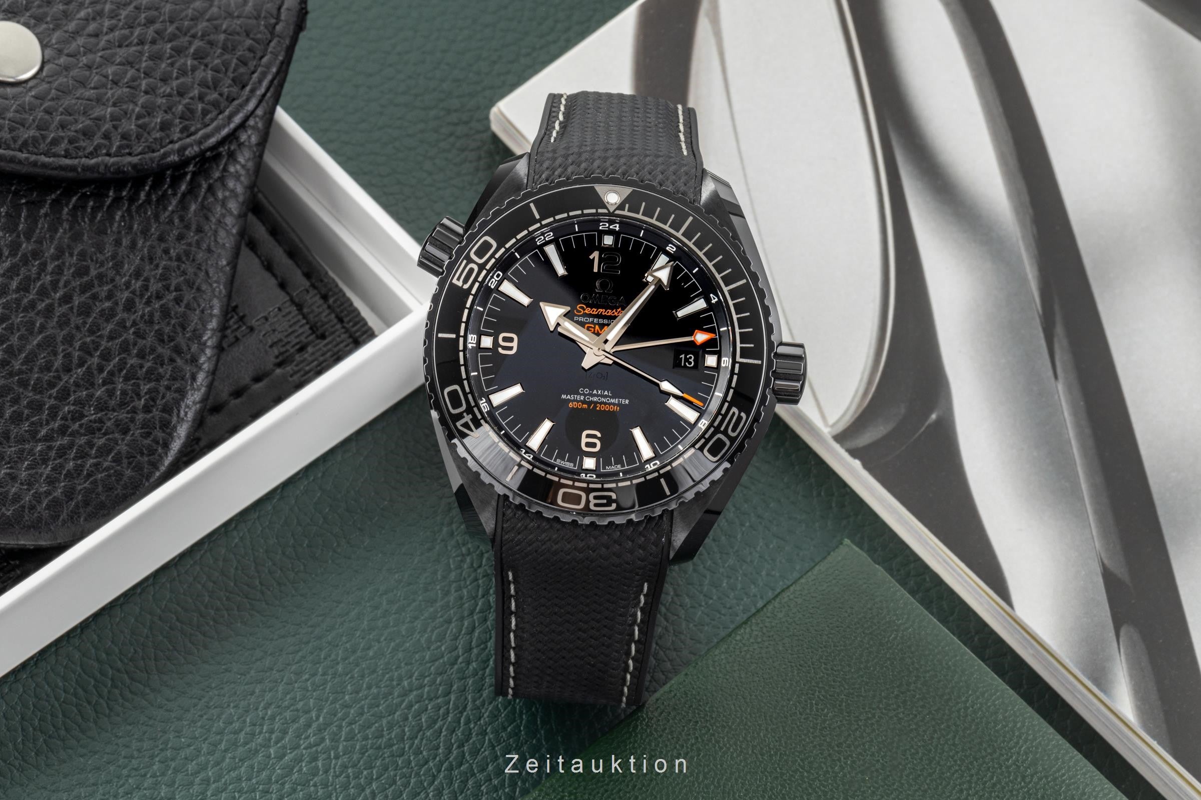 Omega Seamaster Planet Ocean GMT Deep Black 215.92.46.22.01.001 NP: 13100,- € [2300847]