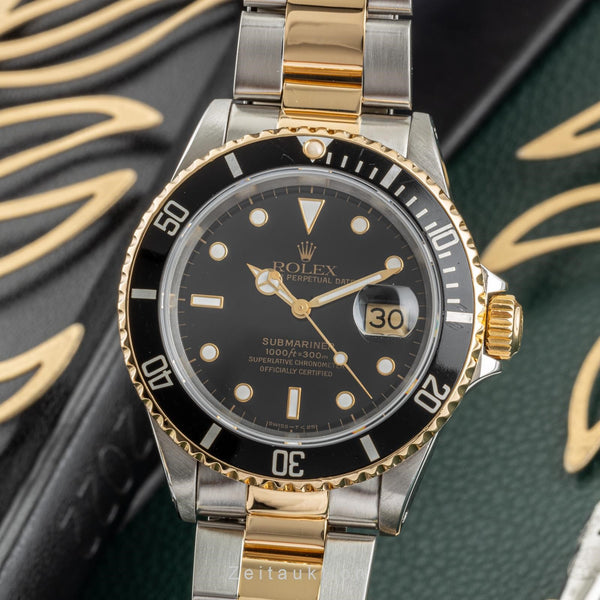 Rolex Submariner steel / gold automatic men's watch 16613 LP: 15350EUR  [2302220]