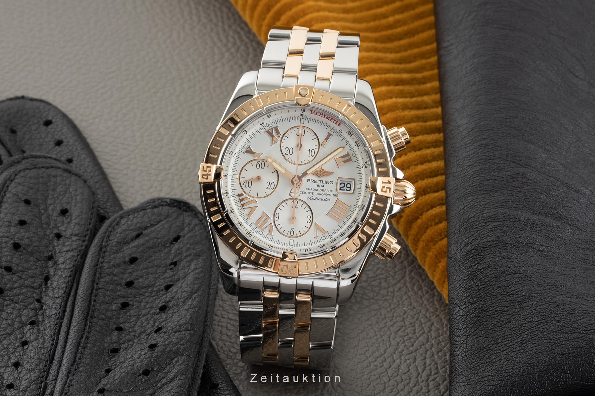 Breitling Chronomat chronograph steel gold automatic B13
