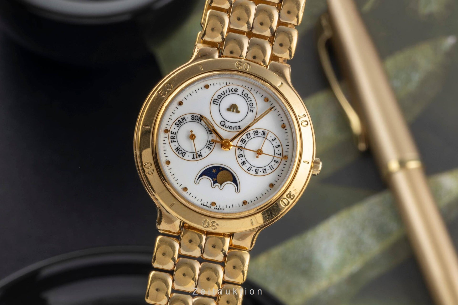 Phase de Lune gilt brass quartz watch 35198 [ ]