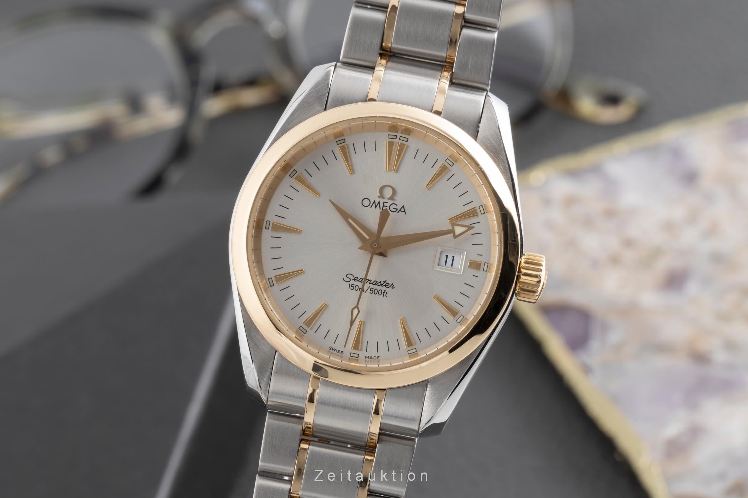 Omega Seamaster steel / gold quartz men's watch 2318.30.00  [2501994]