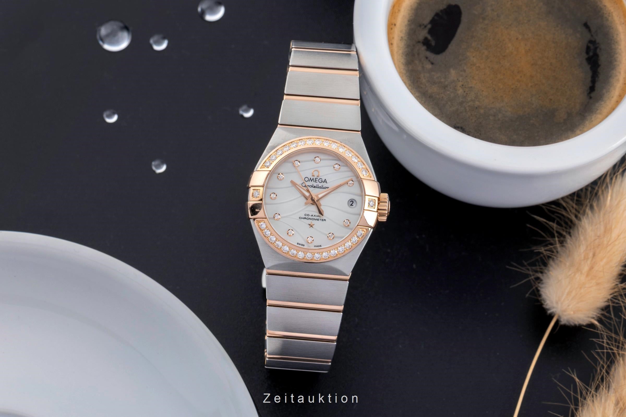 Omega Constellation steel / gold automatic women's watch 123.25.27.20.55.004  [2502219]