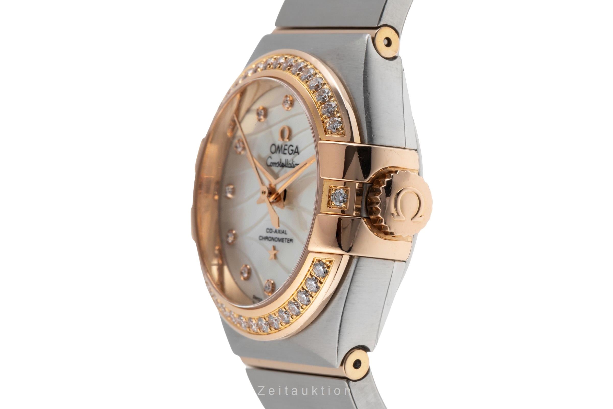 Omega Constellation steel / gold automatic women's watch 123.25.27.20.55.004  [2502219]