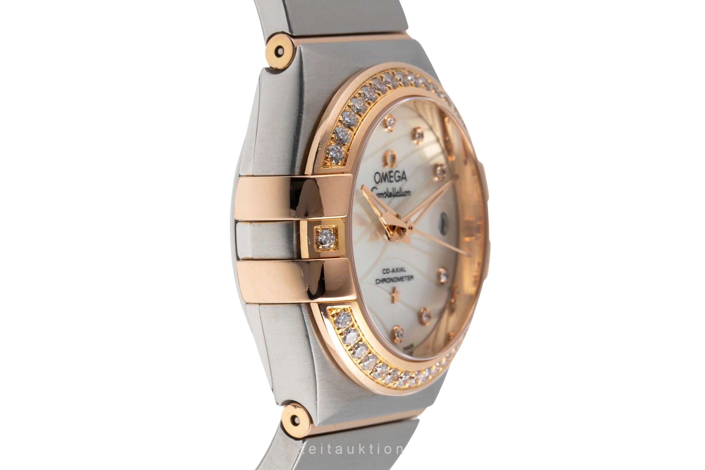 Omega Constellation steel / gold automatic women's watch 123.25.27.20.55.004  [2502219]