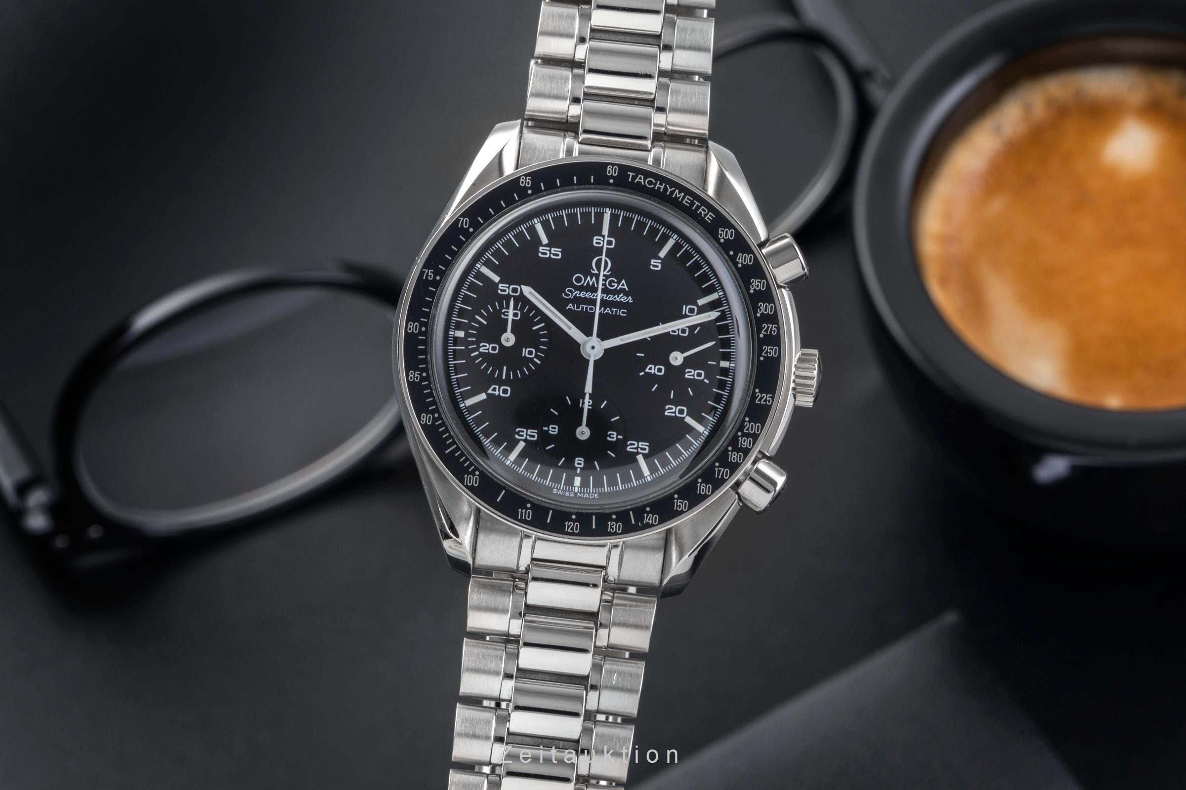 Omega Speedmaster chronograph steel automatic Kal. 3220 Ref