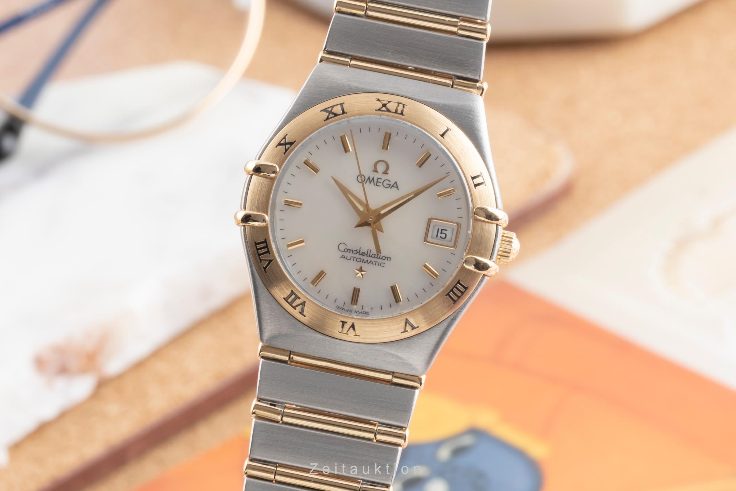 Omega Constellation steel / gold automatic women's watch 1292.70.00  [2503161]