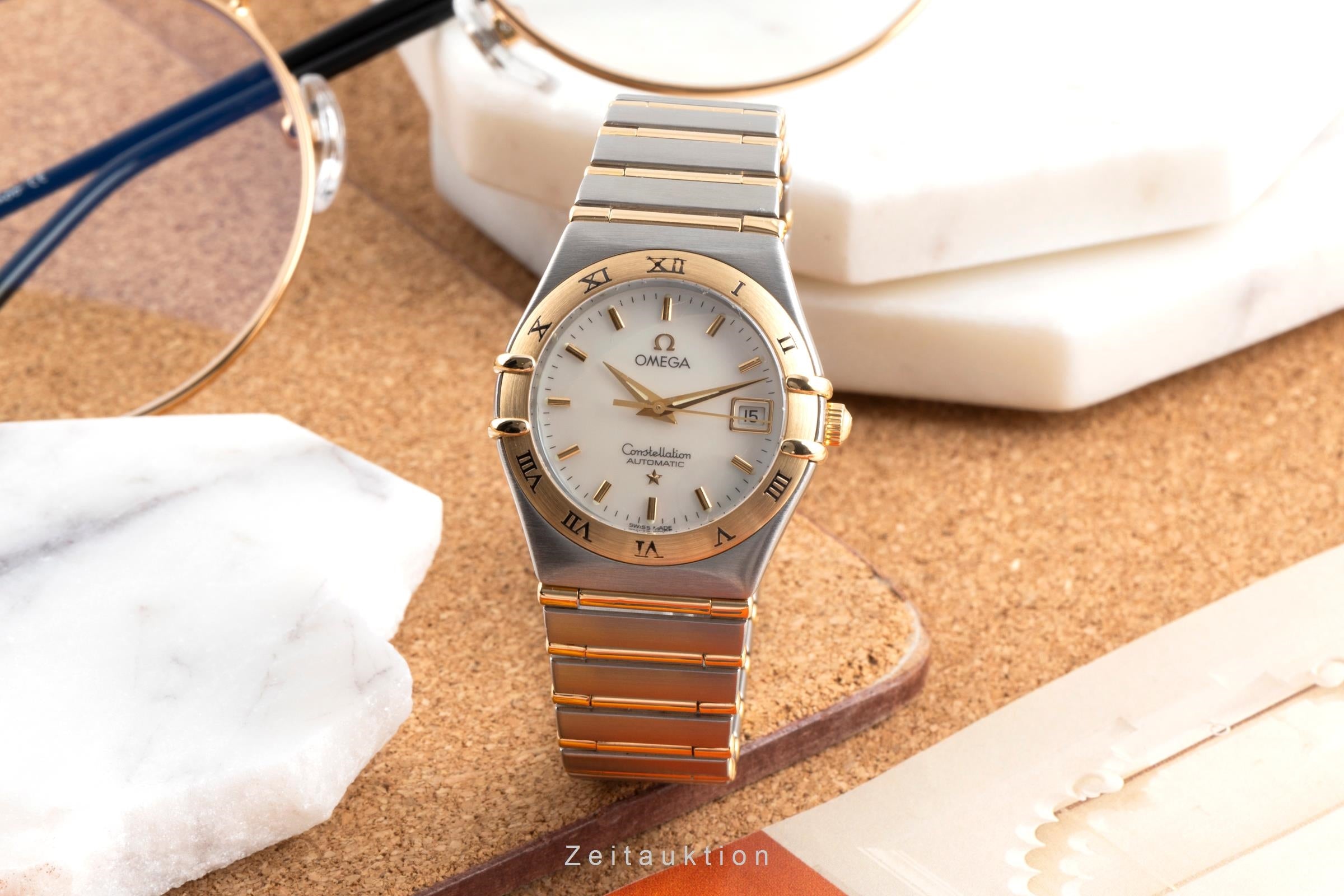 Omega Constellation steel / gold automatic women's watch 1292.70.00  [2503161]