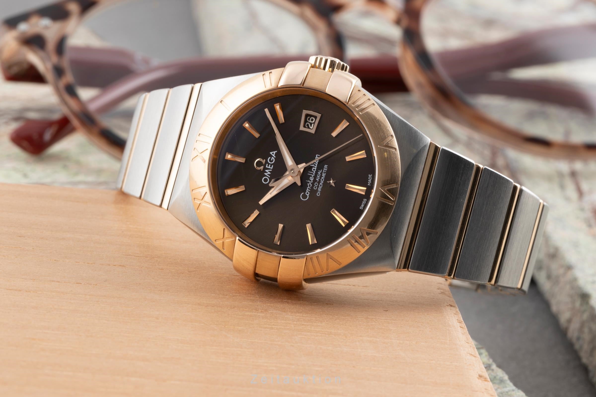 Omega Constellation steel / gold automatic women's watch 123.20.31.20.13.001  [2504025]