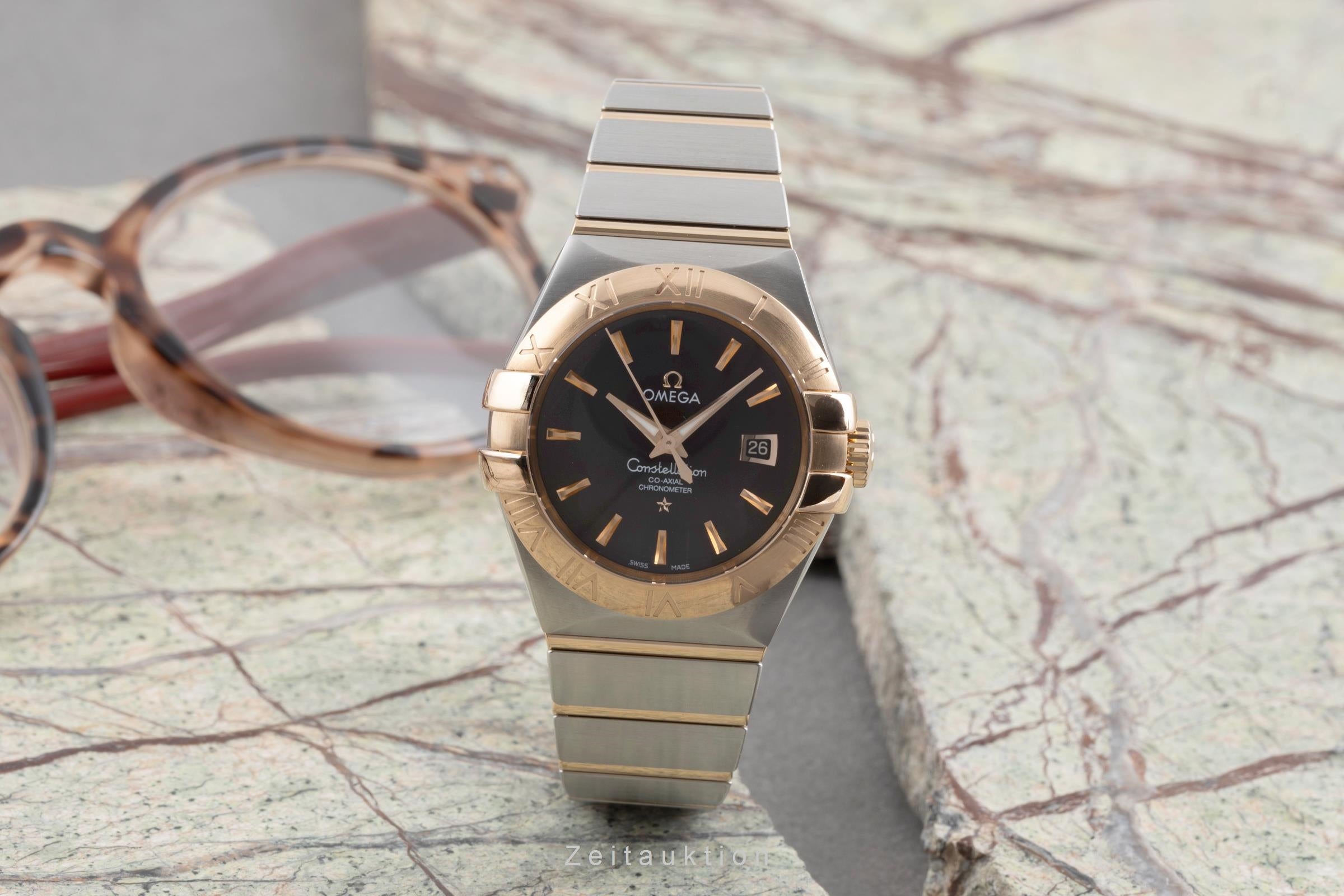 Omega Constellation steel / gold automatic women's watch 123.20.31.20.13.001  [2504025]