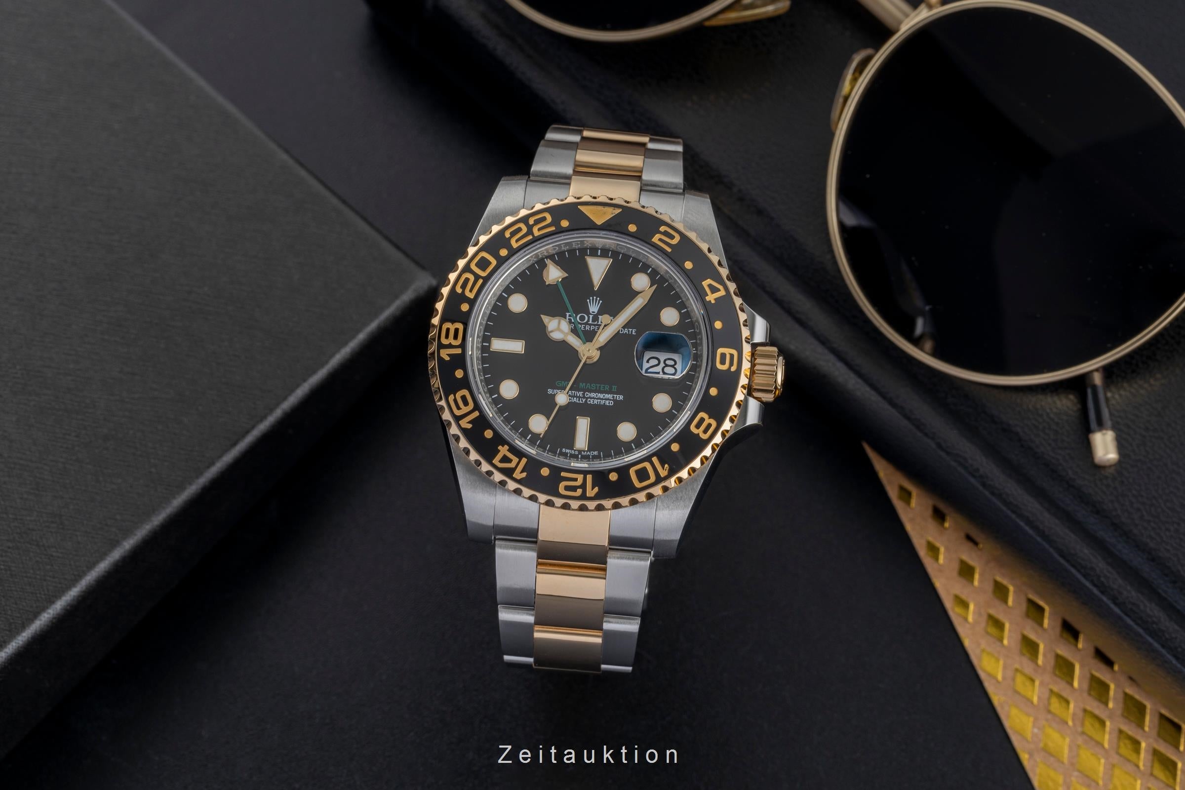 Rolex GMT-Master II steel gold automatic 3186 116713LN