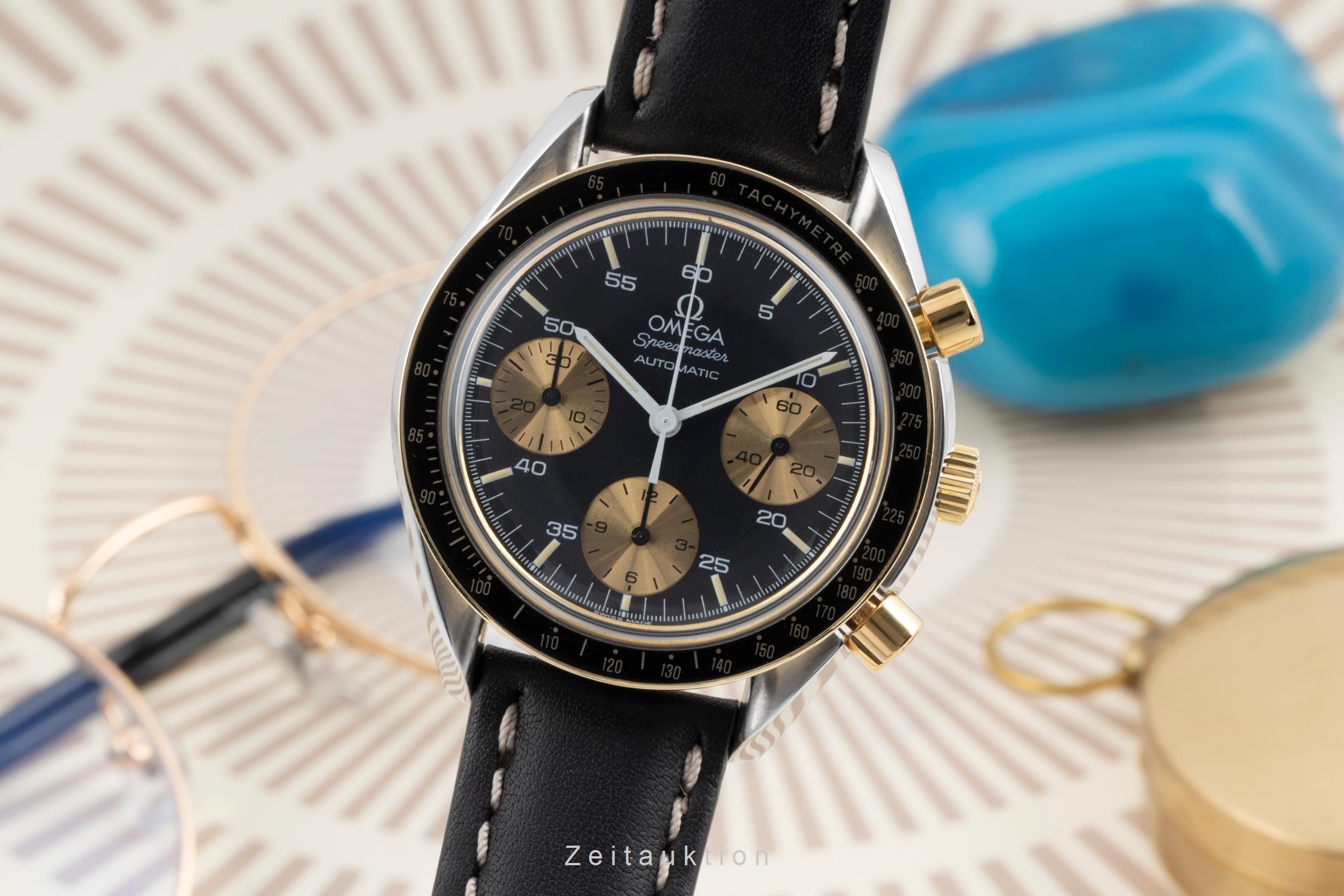Omega Speedmaster chronograph steel / gold automatic Kal. 1140 Ref