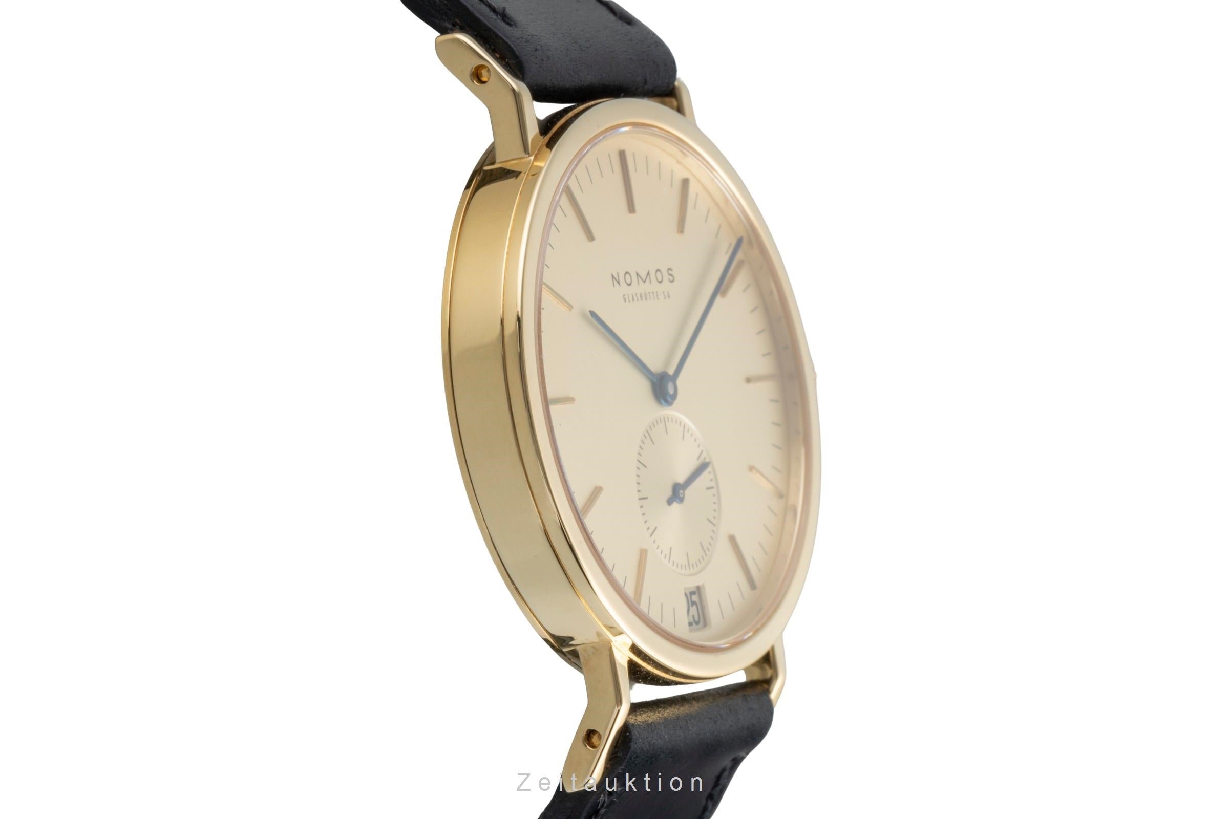 Nomos Tangente 18k (0,750) Gold Intex Datum Handaufzug Herrenuhr Gold Dial  [2505847]