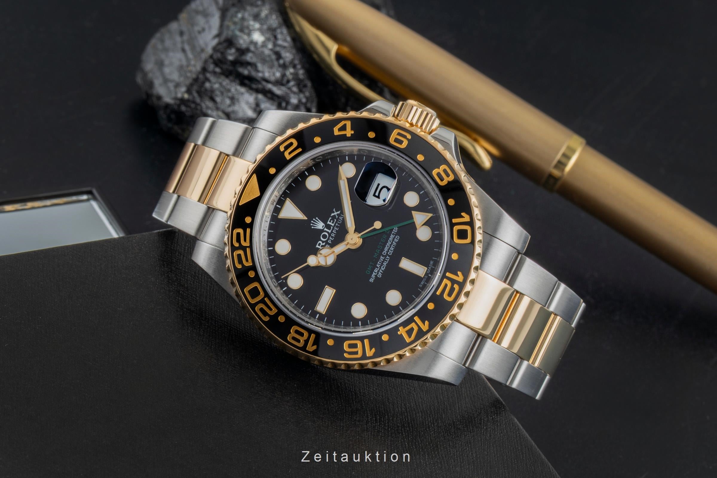 Rolex GMT-Master II steel / gold automatic Kal. 3186 Ref. 116713LN