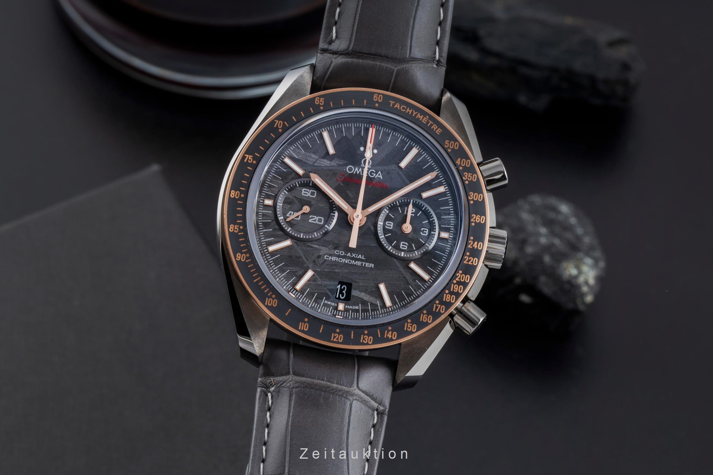 Omega Speedmaster Moonwatch chronograph ceramic / gold automatic men's watch 311.63.44.51.99.001 LP: 15900EUR  [2506570]