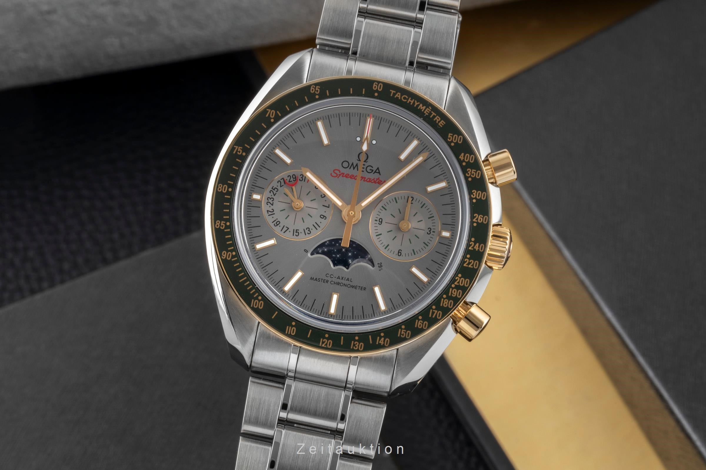 Omega Speedmaster chronograph steel / gold automatic Kal. 9904 Ref