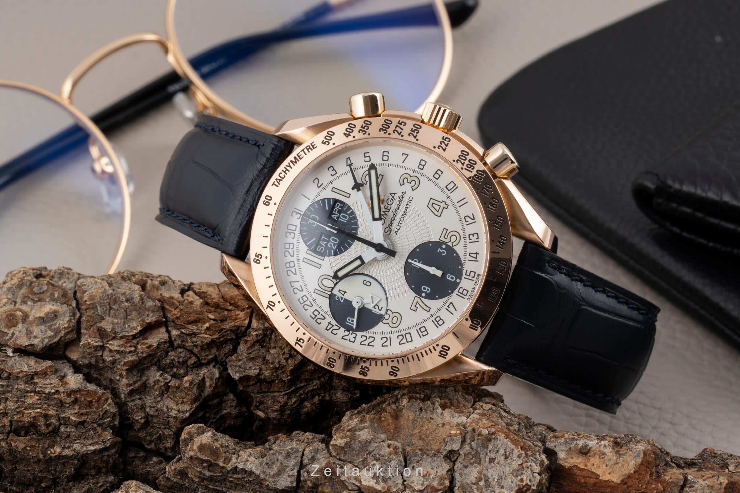 Omega Speedmaster chronograph 18 ct red gold automatic Kal. 1151