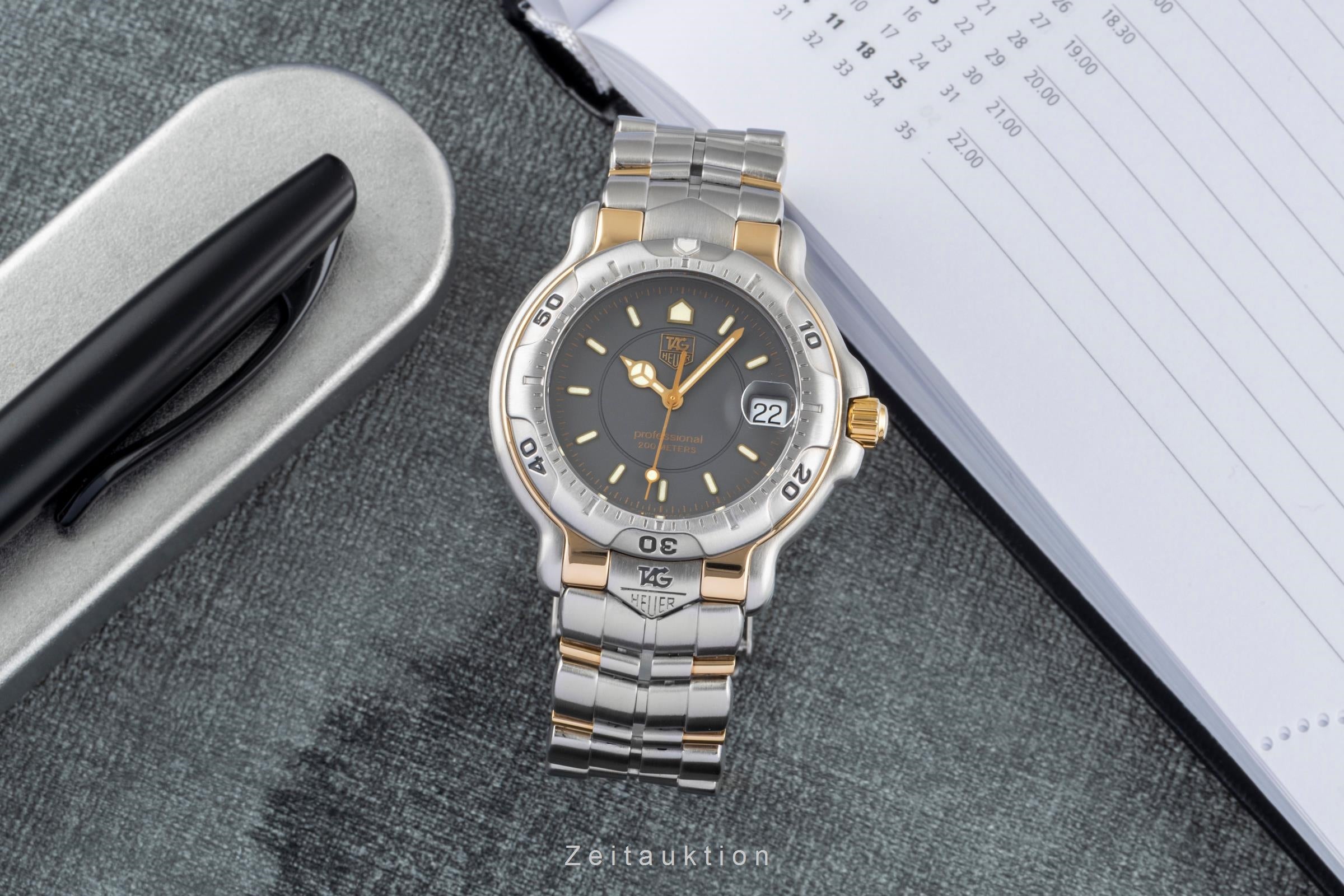 Tag Heuer Professional steel / gold quartz men's watch WH1152  [2507526]