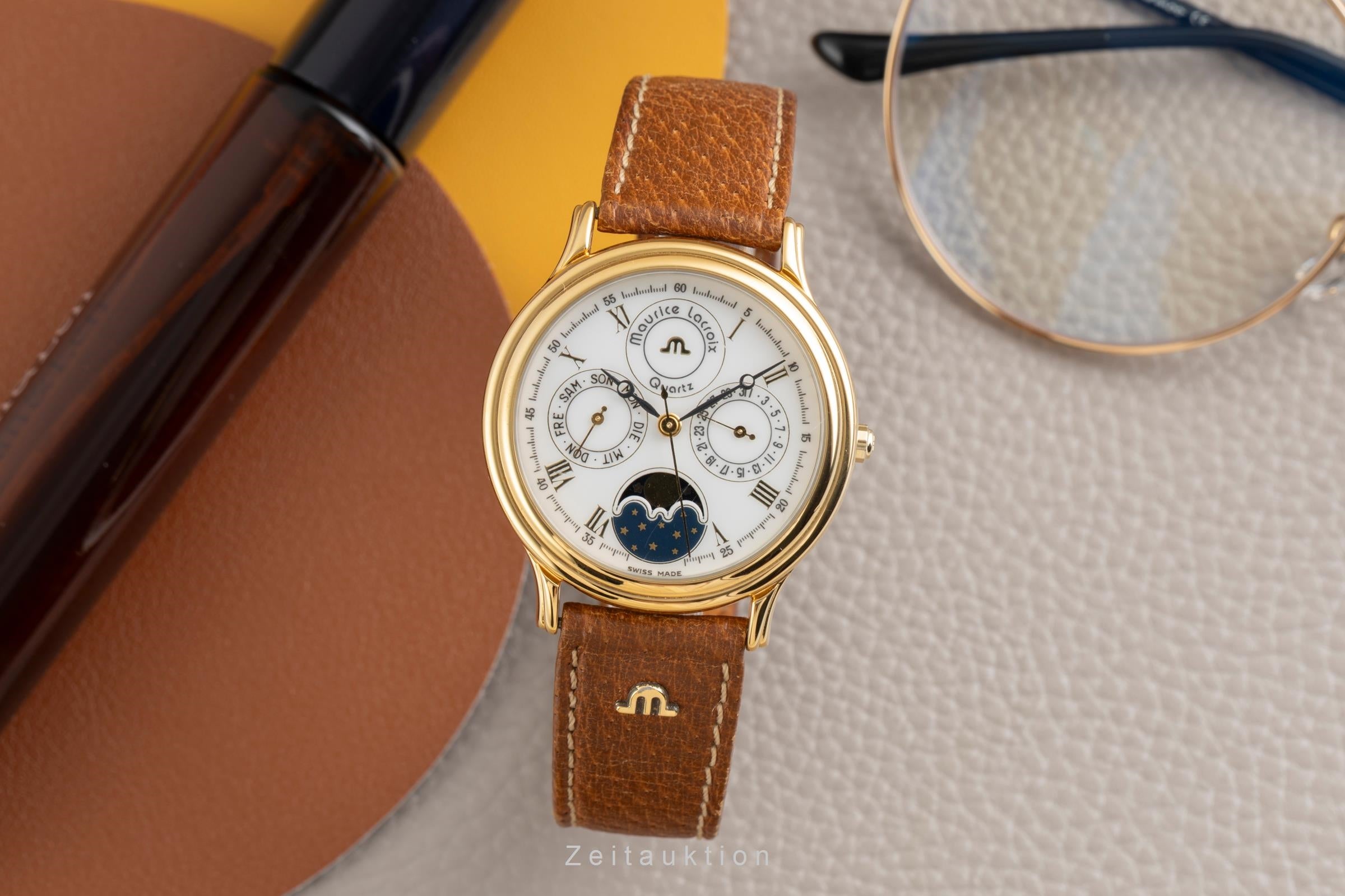 Maurice Lacroix Kalender Messing vergoldet Quarz Herrenuhr Ref. 33998  [2600212]