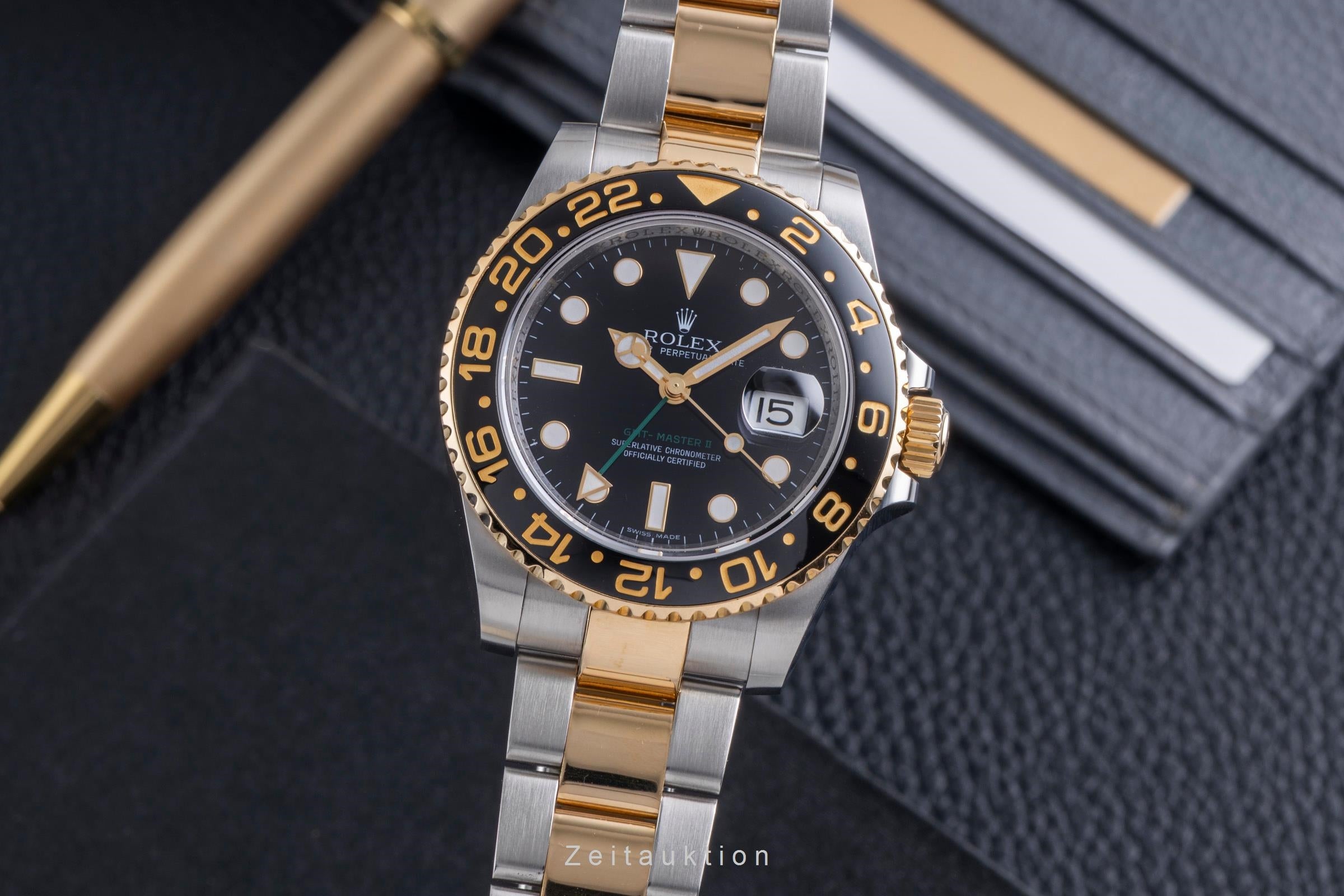 Rolex GMT-Master II steel / gold automatic Kal. 3186 Ref. 116713LN