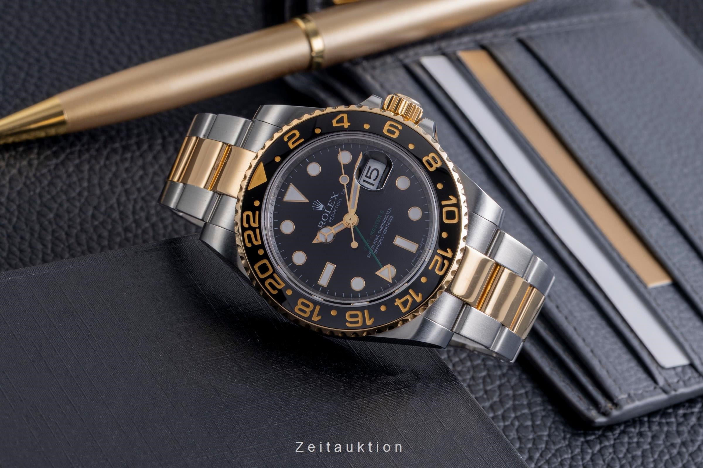 Rolex GMT-Master II steel / gold automatic Kal. 3186 Ref. 116713LN