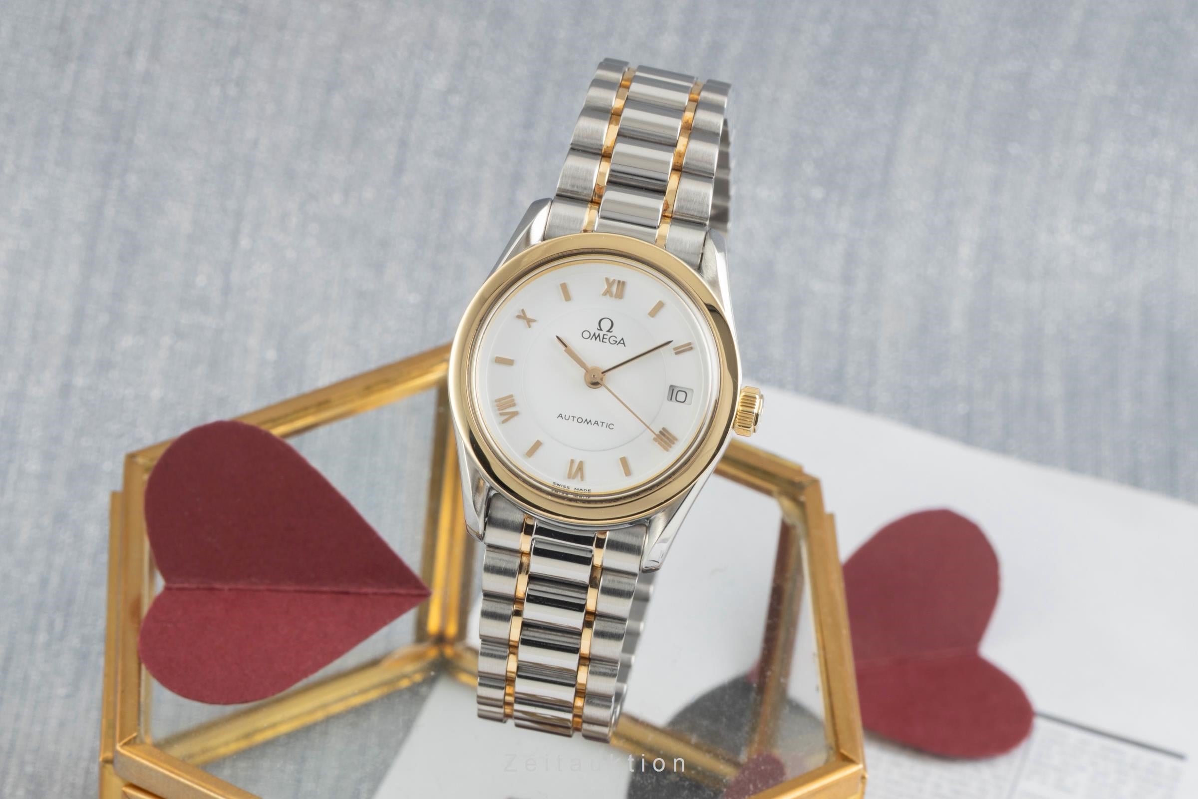 Omega Classic steel / gold automatic women's watch 566.0285,  766.0885  [2603151]
