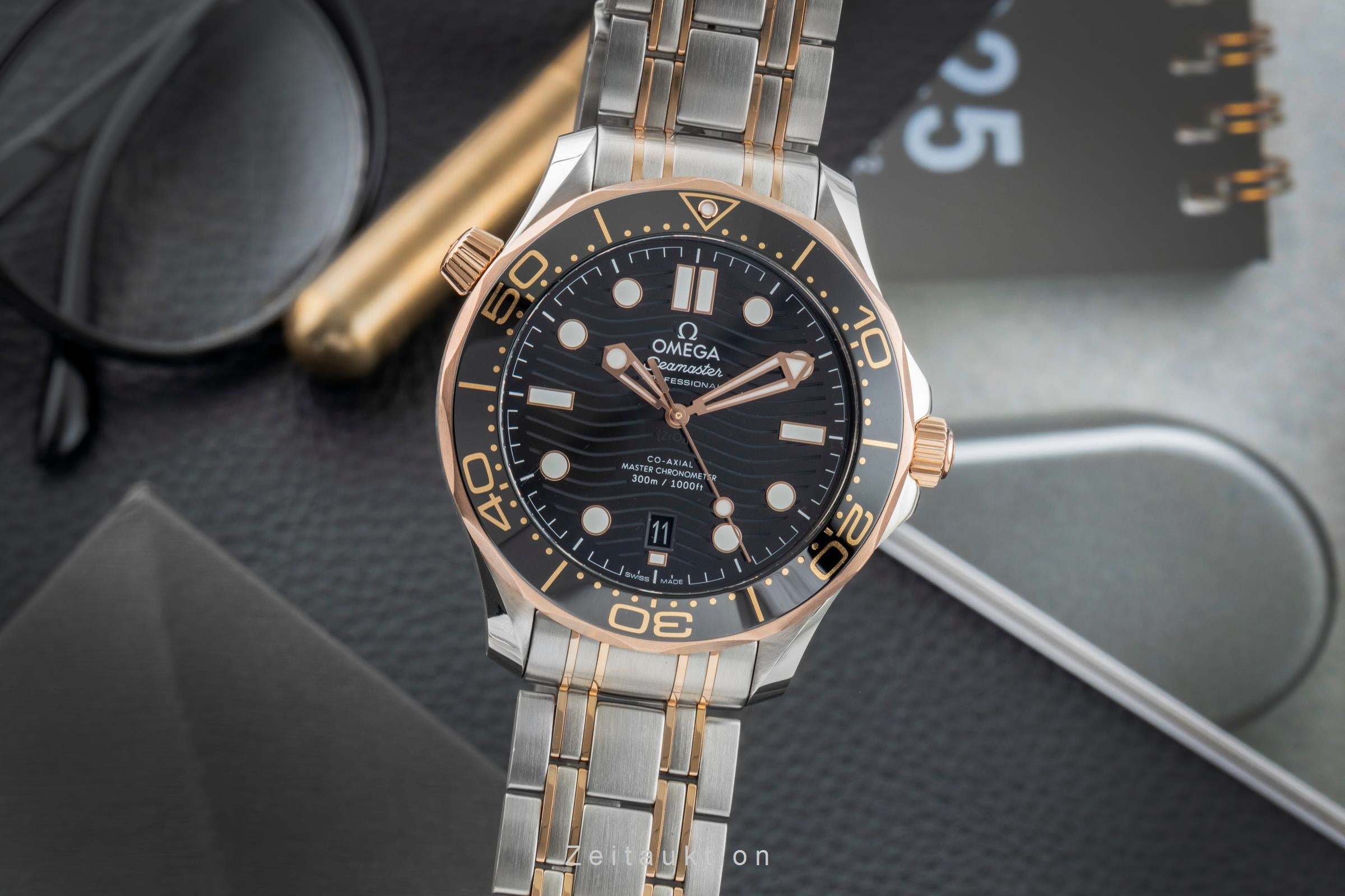 Omega Seamaster steel / gold automatic men's watch 210.20.42.20.01.001 LP: 14200EUR  [2603196]