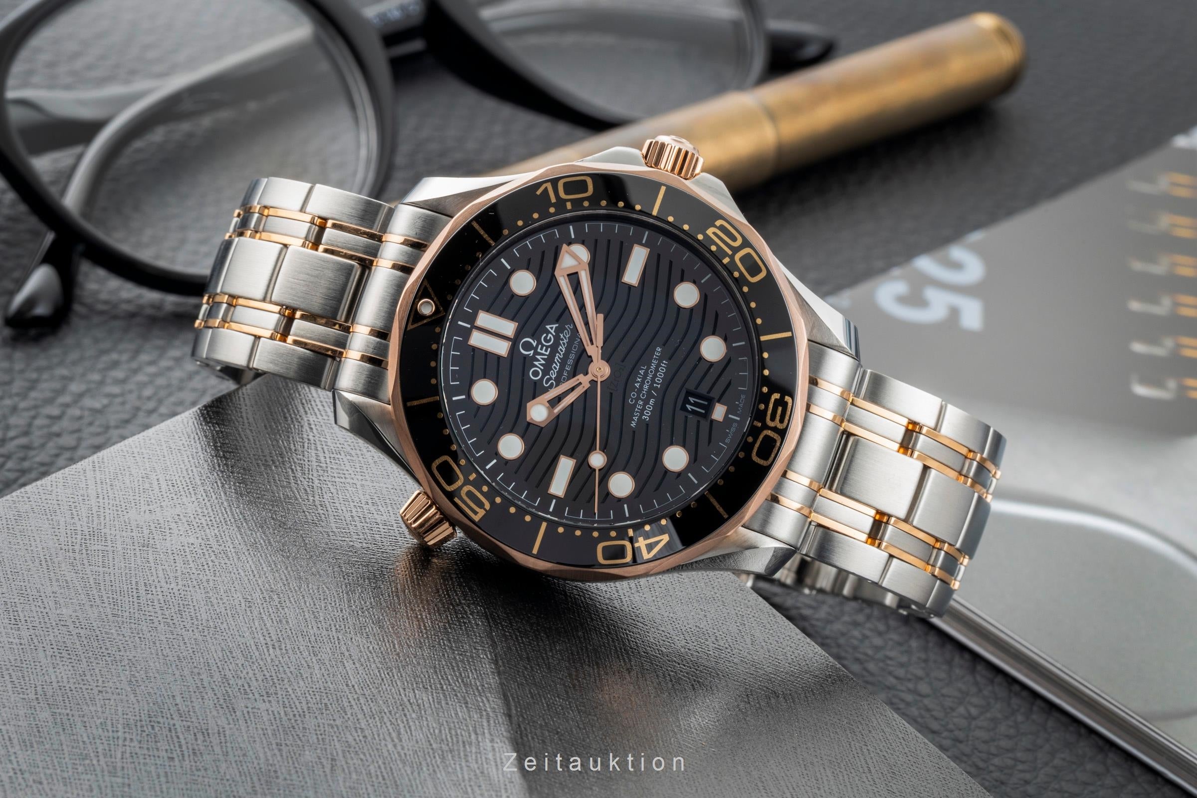 Omega Seamaster steel / gold automatic men's watch 210.20.42.20.01.001 LP: 14200EUR  [2603196]