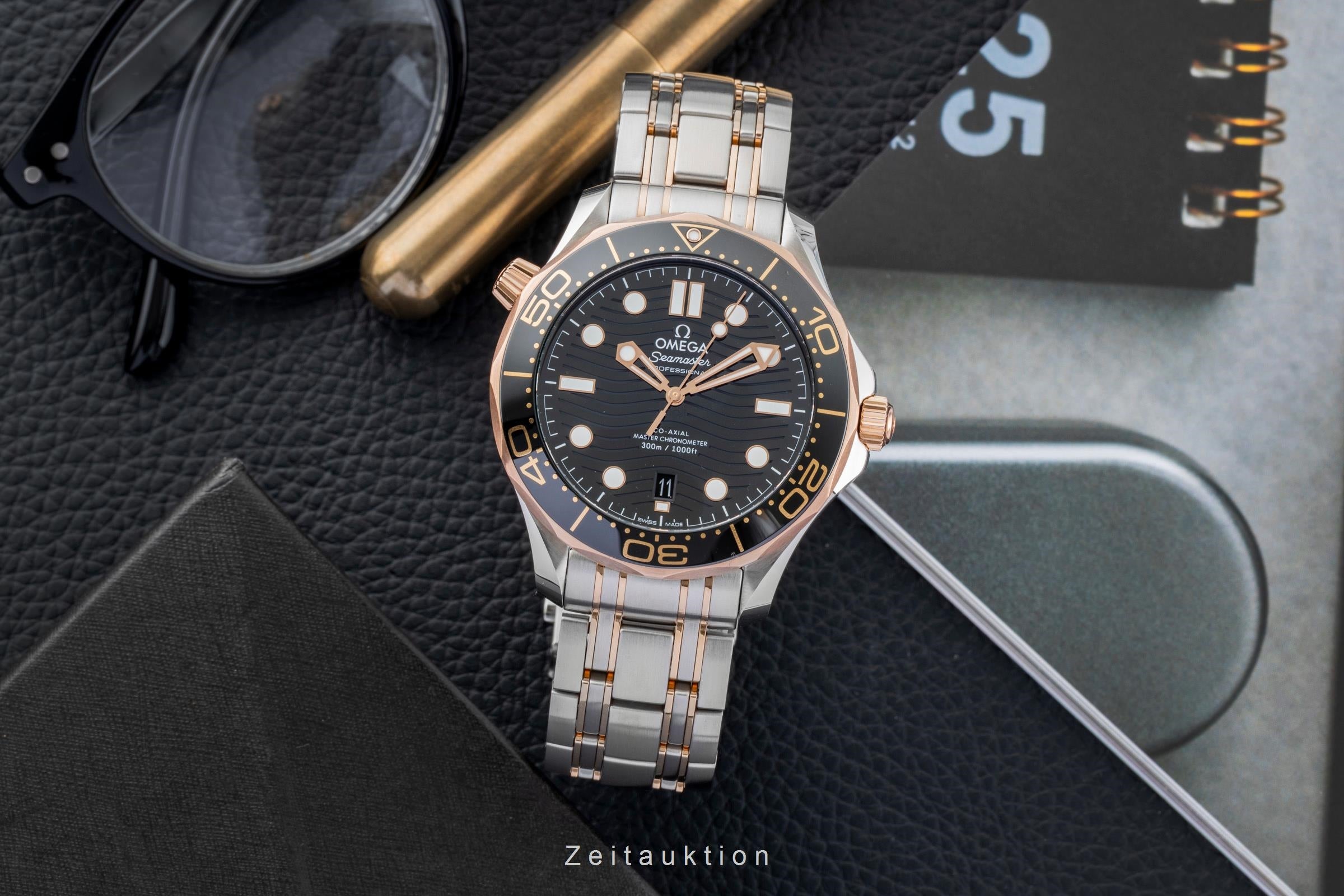 Omega Seamaster steel / gold automatic men's watch 210.20.42.20.01.001 LP: 14200EUR  [2603196]
