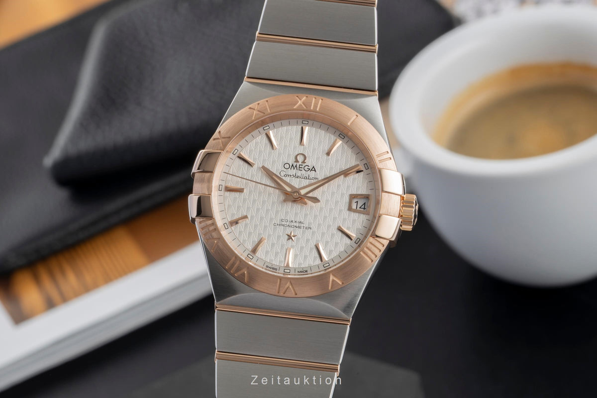 Omega Constellation steel / gold automatic men's watch 123.20.38.21.02.008  [2605362]