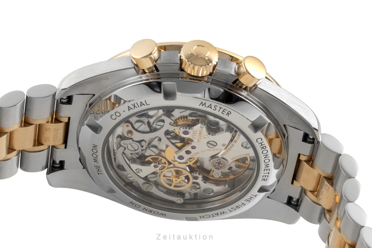 Omega Speedmaster Moonwatch chronographe acier / or  à remontage manuel montre pour hommes 310.20.42.50.02.001 LP: 20400EUR  [2605886]