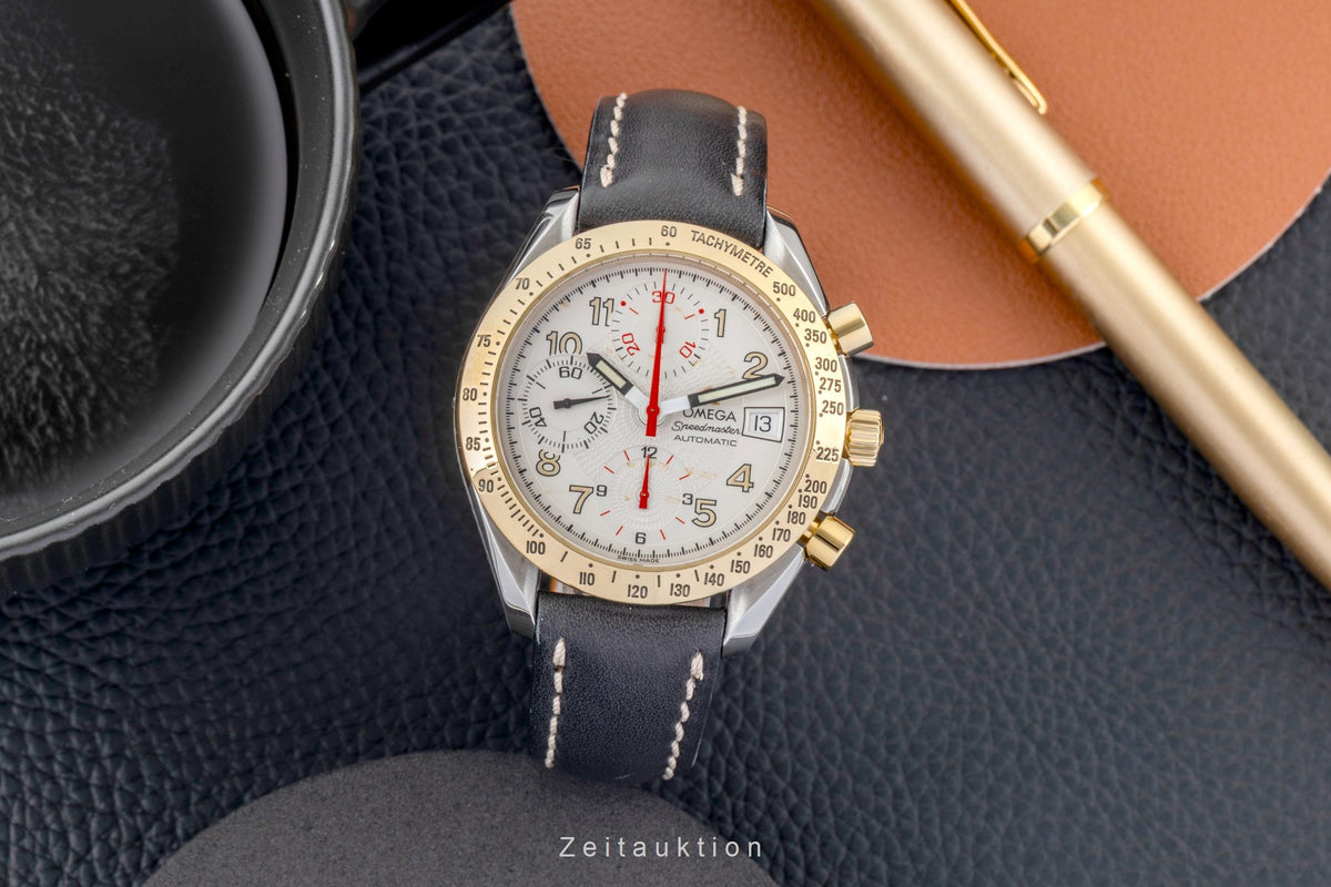 Omega Speedmaster Date chronograph steel / gold automatic men's watch 3313.33.00  [2605953]