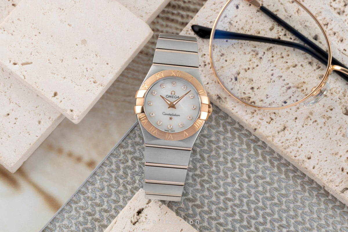 Omega Constellation steel / gold quartz women's watch 123.20.27.60.55.003  [2606331]