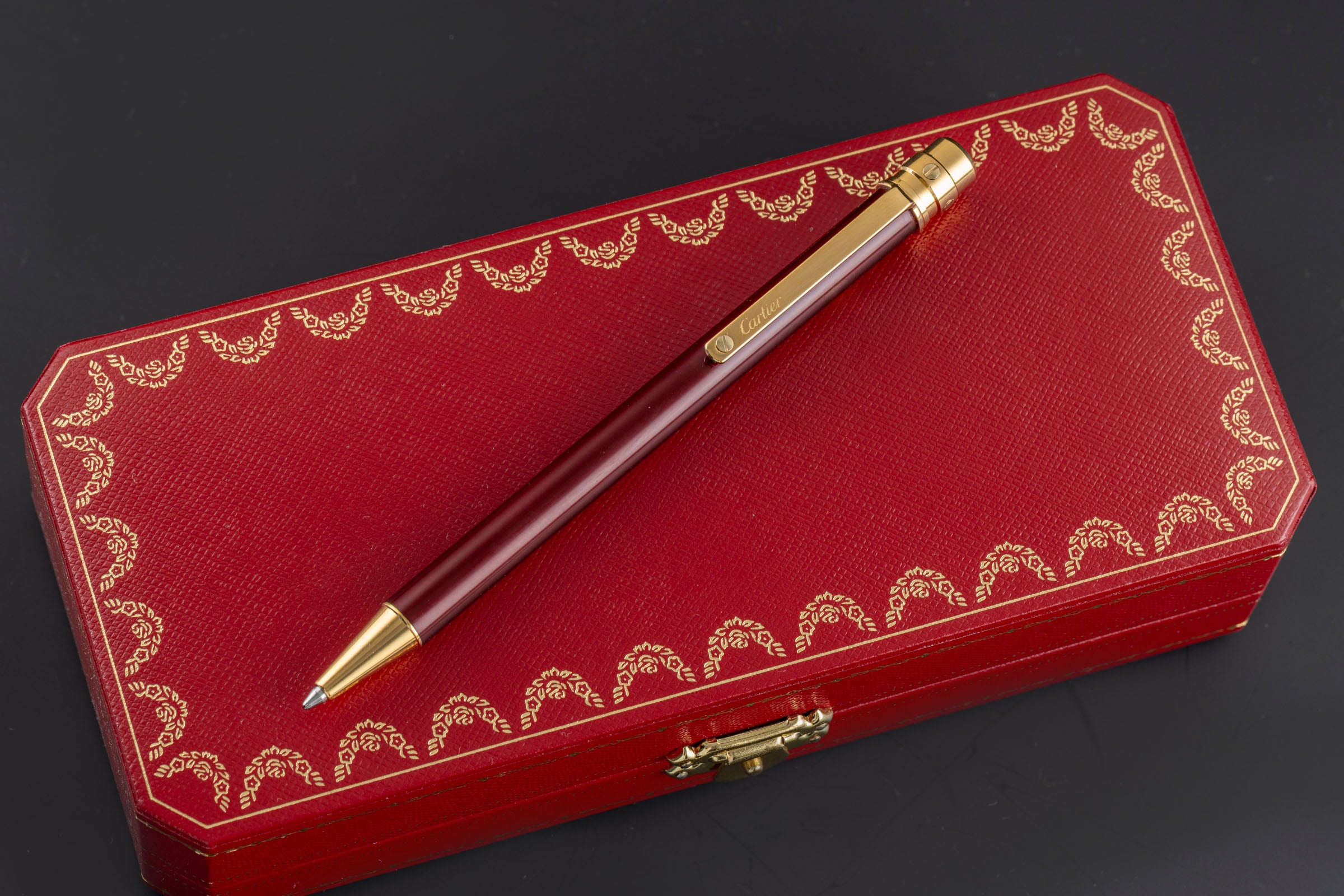 Cartier Must II Santos bolígrafo laca Bordeaux chapado en oro Ref. ST 150190[KL25988]